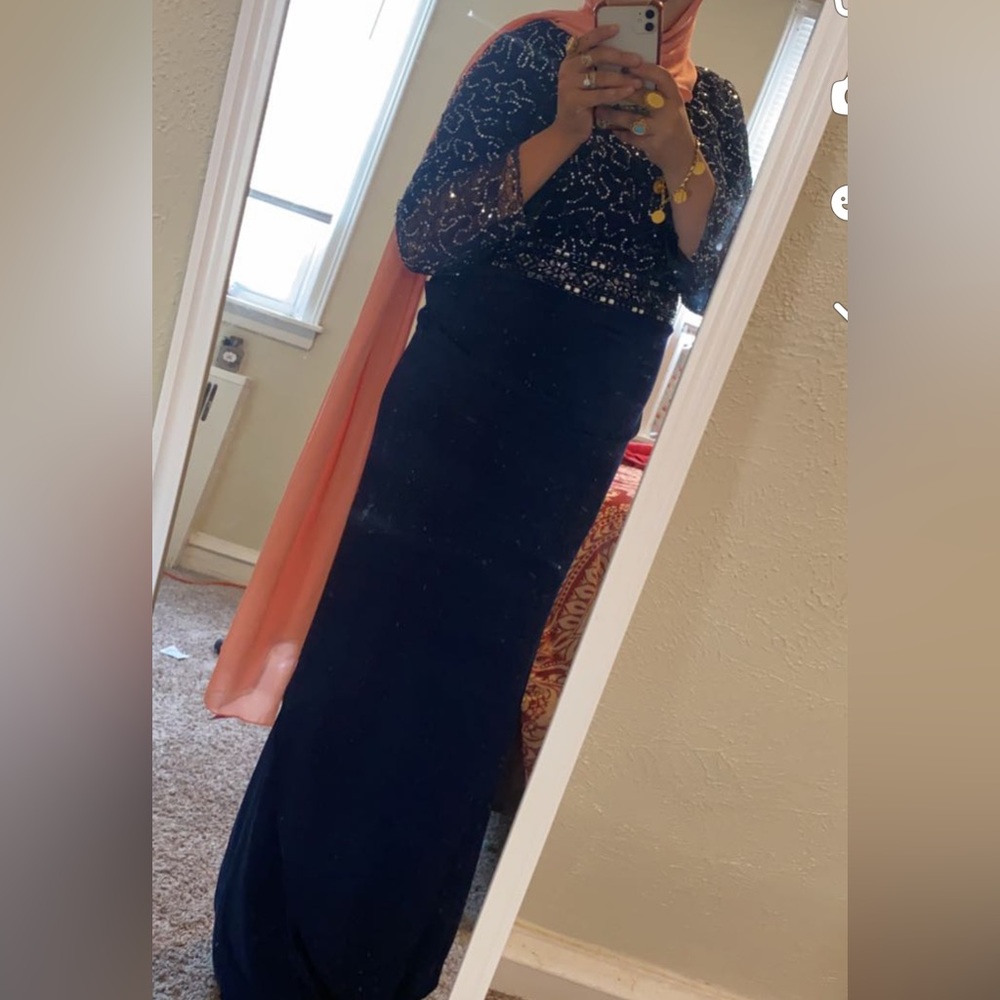 Very nice dress like the picture wear it one time like new